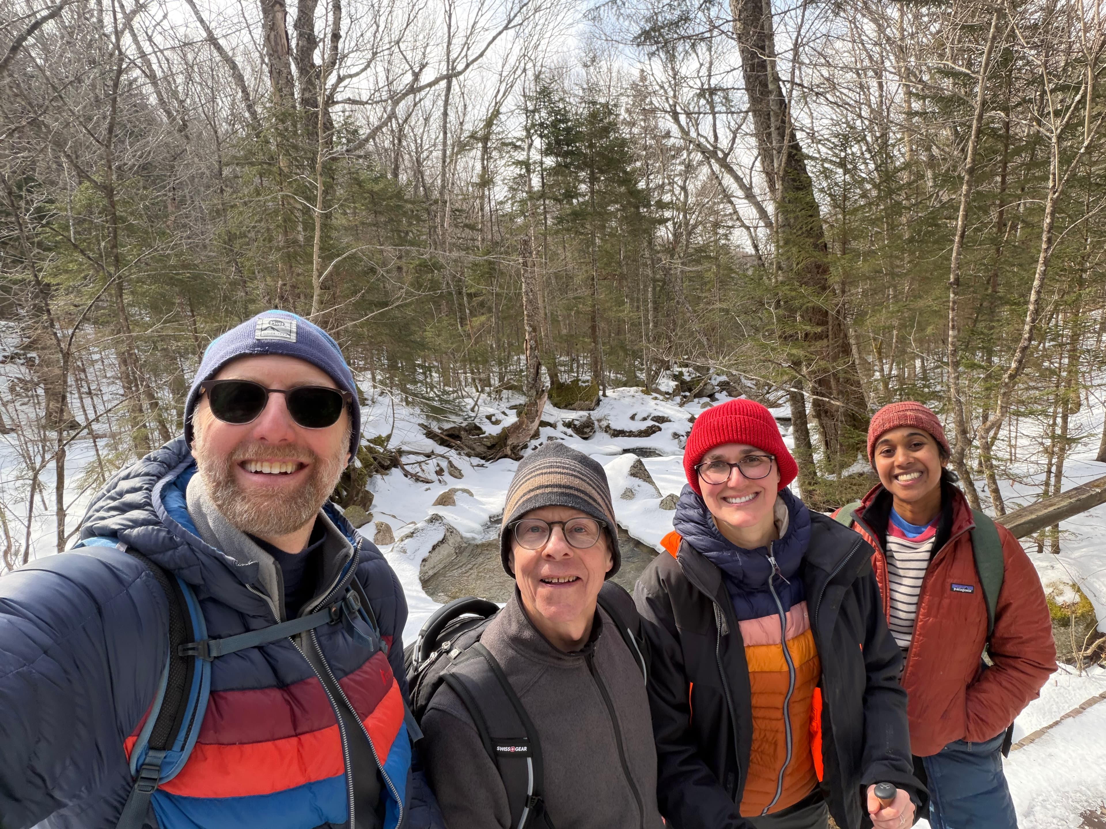 Zev Schuman-Olivier, Todd Griswold, Kiera Fredericksen, and Richa Gawande on the trail to a nearby waterfall