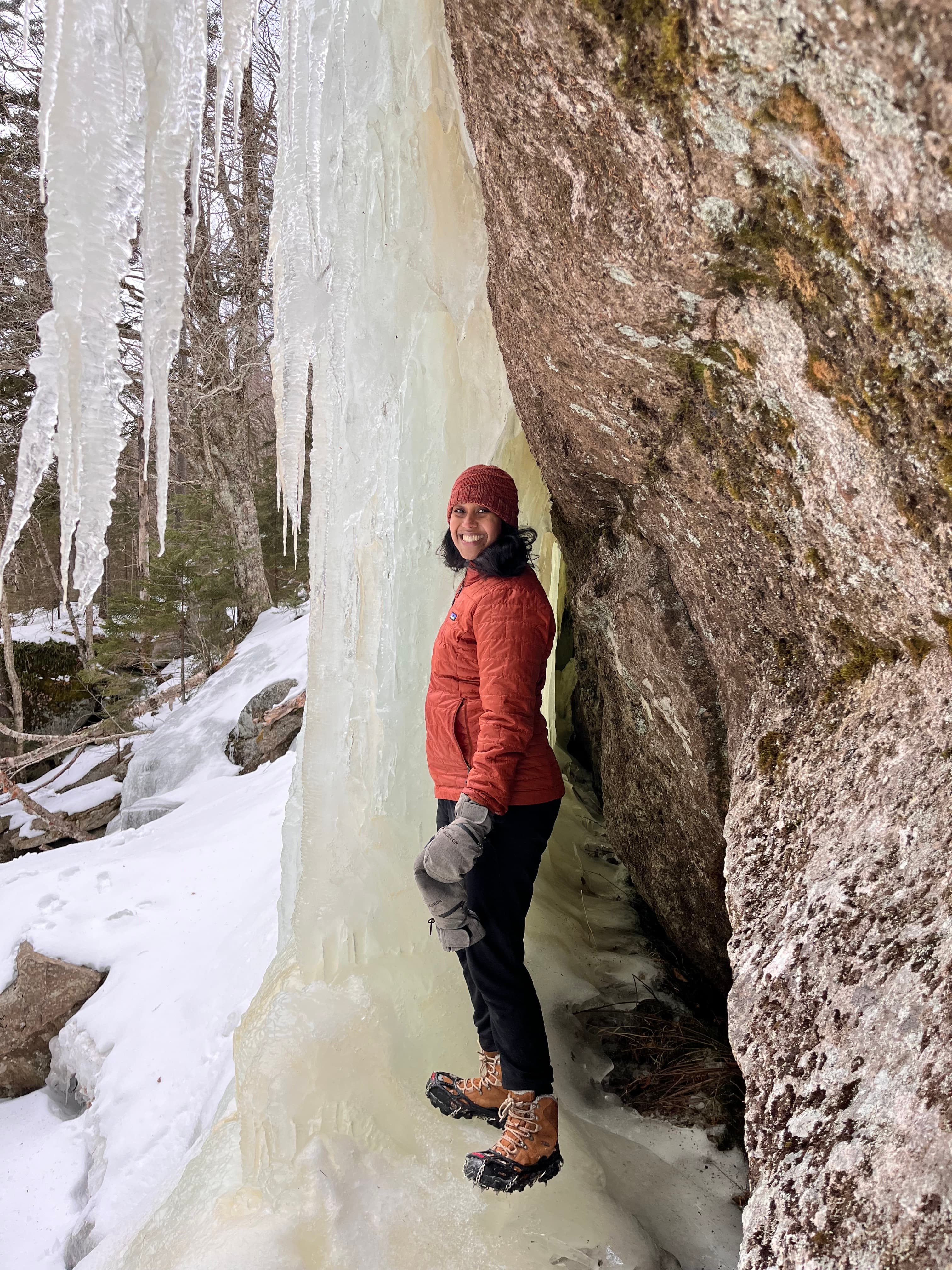 Richa Gawande tucked into an ice cave along the trail