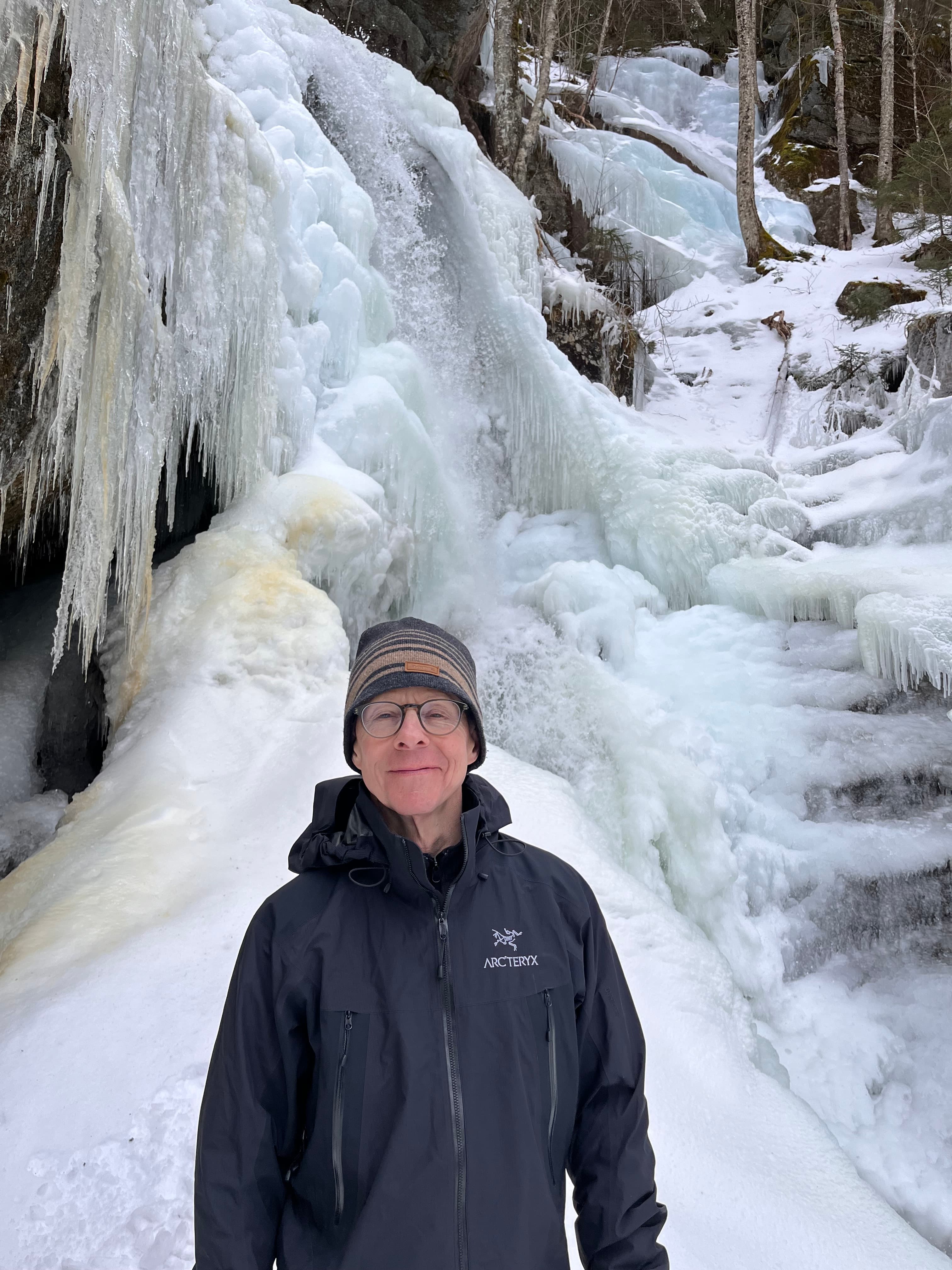Todd Griswold in front of the frozen falls